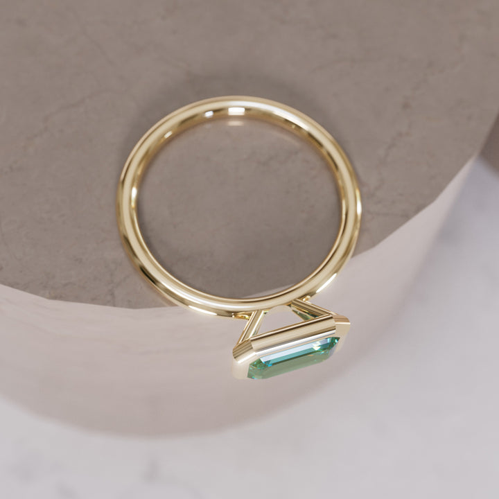 Unique Green Sapphire Engagement Ring, Horizontal Emerald Cut Bezel Set By Valley Rose