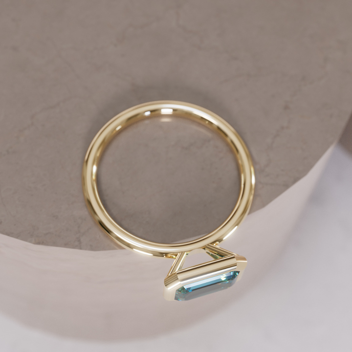 Unique Teal Sapphire Engagement Ring, Horizontal Emerald Cut Bezel Set By Valley Rose