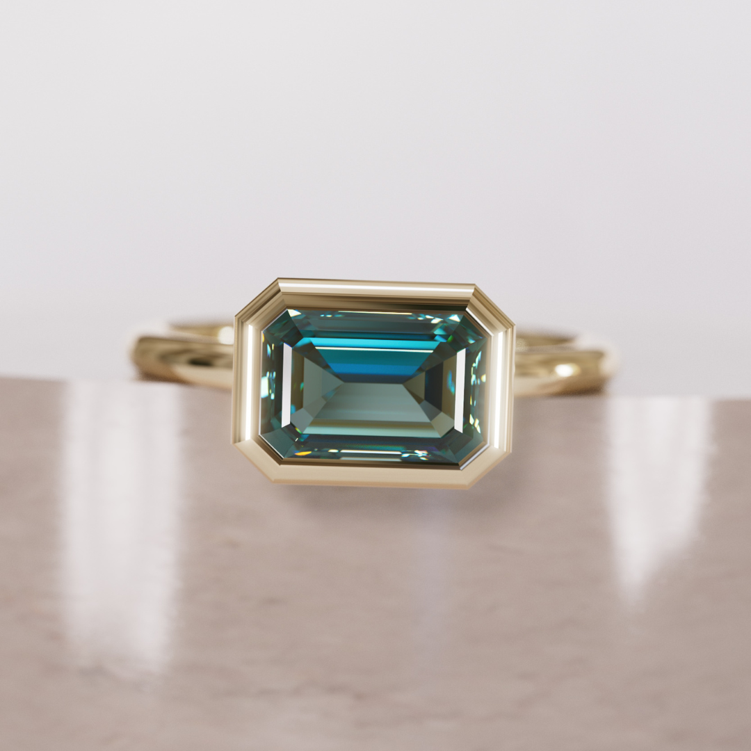 Unique Teal Sapphire Engagement Ring, Horizontal Emerald Cut Bezel Set By Valley Rose