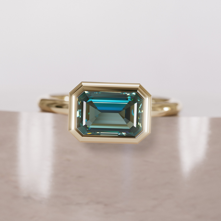 Unique Teal Sapphire Engagement Ring, Horizontal Emerald Cut Bezel Set By Valley Rose