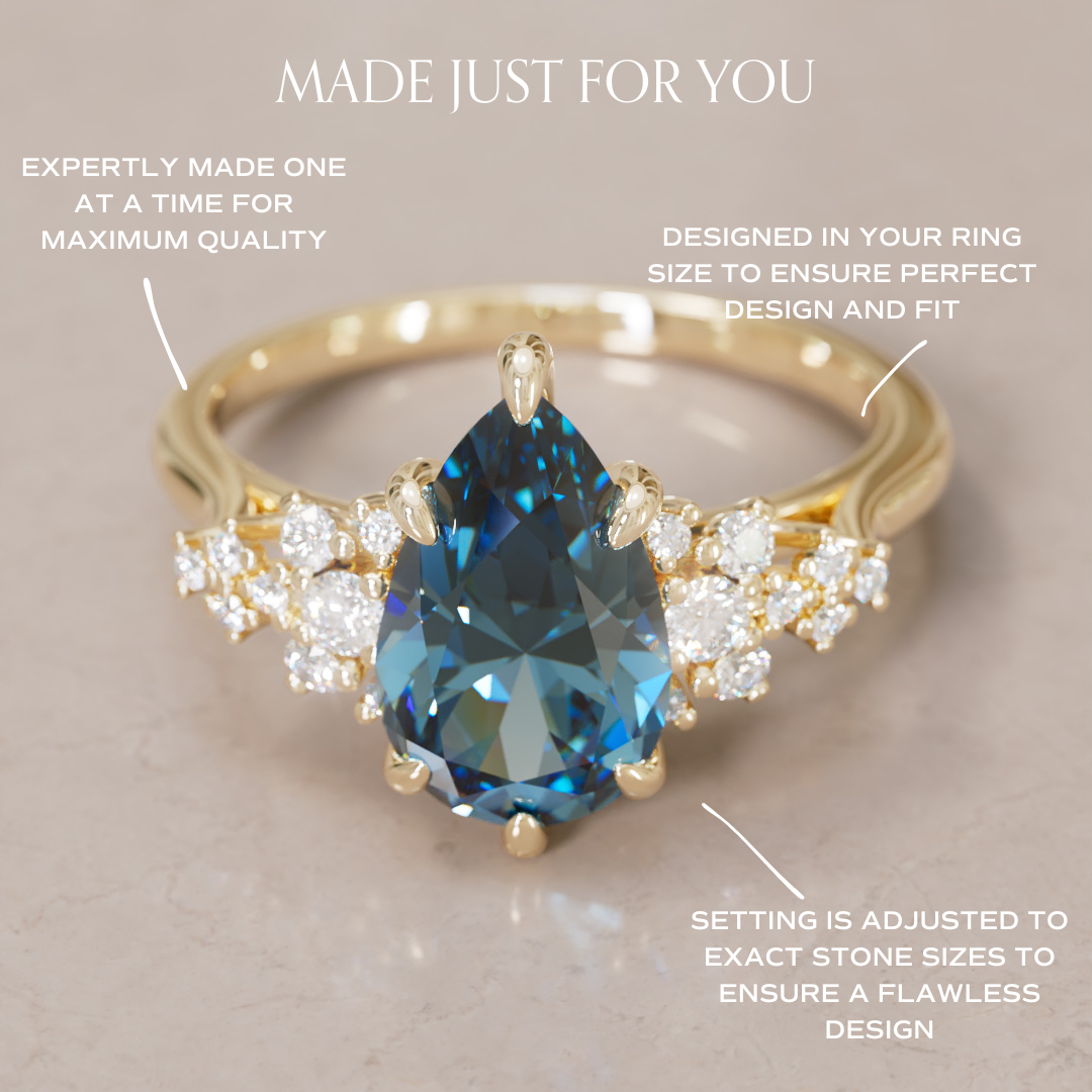 Unique Vintage Engagement Ring with Pear Cut Blue Sapphire By Valley Rose